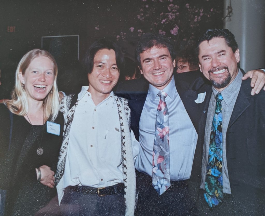 Dana Clark, Goldman Prize winner Ka Hsaw Wa, Elías, and Oscar smile at the camera at Goldman Prize ceremony in DC in the year 2000.